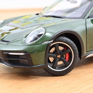 Lieferbar ab 24.09.2024 Porsche 911 Dakar 2023 Oakgreenmetallic 1:18 Norev 1:18 Metallmodell 2 Türen und Motorhaube  zu öffnen!